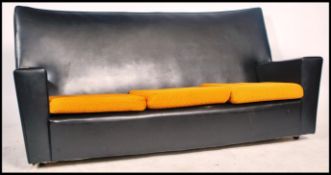 A retro 1960's 3 piece suite in two tone colourway. The excellent condition suite comprising a large