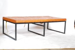 An unusual mid century French leather daybed - sofa settee. The simple form base of ebonised