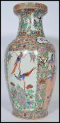 A large Chinese 20th century famille rose pattern vase of baluster form having geometric floral