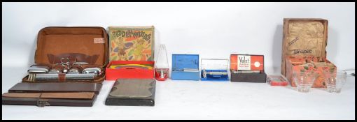 A collection of vintage items to include various cased Gillette and other razors, vintage cribbage