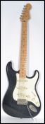 A Fender Squire Stratocaster electric six string guitar with blue body white scratch plate. Measures