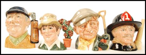 A group of four Royal Doulton character jugs to include The Fireman D6697 , The Gardener D6630 and