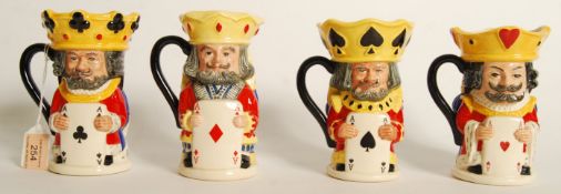Four Royal Doulton limited edition small double-sided character jugs, each modelled by Stanley James