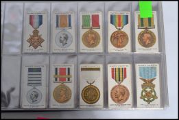 Cigarette cards; three albums of cigarette cards, all appearing to be full / complete sets (some