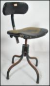 A retro mid century Tansad Industrial office - clerks swivel chair. Raised on a tubular metal base