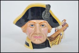 A Royal Doulton character jug depicting Lord Horatio Nelson D7236 , handle modelled after the HMS