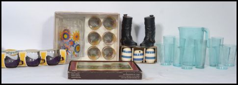 A collection of retro items to include lemonade set, drinking glasses, ceramics, place mats,