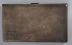 A 20th century silver hallmarked cigarette / card case of larger form having an engine turned