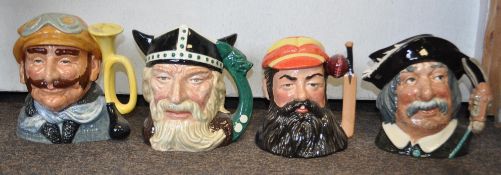 A group of 5 Royal Doulton character jugs to include Veteran Motorist D6633 , Sancho Panca D6456 ,