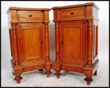 A good pair of French walnut and marble top bedside cabinets. Raised on bun feet with a single