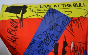 A collection of vintage art and music related posters to include a signed Timour Lam 