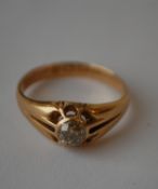 A Victorian hallmarked 18ct gold and diamond ring set with a solitaire old cut diamond in a