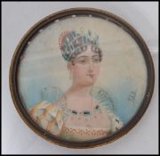 An early 19th century watercolour on ivory portrait miniature painting of Empress Eugenie. The