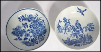 Two 18th century Worcester pearlware pearl ware saucer plates depicting birds and foliage, one