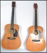 Two 20th century six string acoustic guitars to include a Hohner Arbor  and a Hondo II