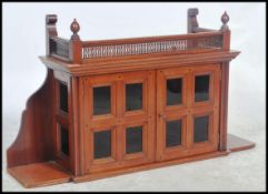 A 19th century Victorian solid mahogany hanging cabinet. The twin door cabinet with multi glass