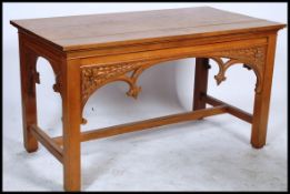 A large 20th century carved oak ecclesiastical communion table. The pugin style table with