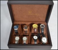 A collection of watches in a presentation watch case to include Constantine Weisz, Admiral Nelson,