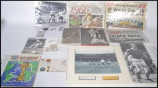 A collection of autographs and ephemera pertaining to the 1966 World Cup to include Bobby Charlton ,