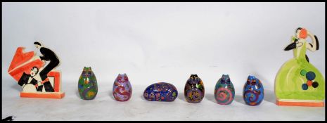 A group of vintage 20th century Laurel Burch art deco ceramic cat figurines raised on gilt
