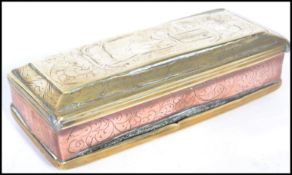An 18th century Dutch snuff box of copper and brass construction. Etched with buildings houses