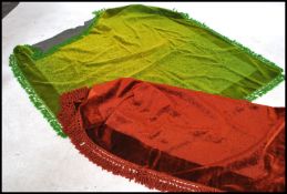 Two vintage 20th century cotton Chenille tablecloths in vibrant green and red colours having