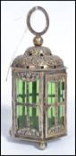 A continental silver hallmarked lantern of hexagonal form having six green glass panels. Raised on