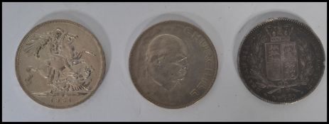 A first half of the 19th century young Victoria bust silver crown dating to 1845 together with a