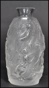 A Lalique pressed glass miniature vase depicting nude maiden and flowers. Etched signed to base