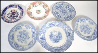 A collection of six ceramic 19th century cabinet plates to include Imari style, blue and white