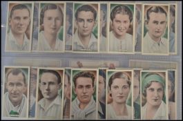 A collection of sets and part sets vintage cigarette cards held within an an album to include