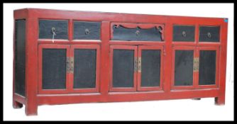 An antique 20th century large Chinese sideboard be