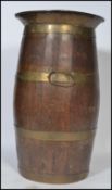 A stunning late 19th century / early 20th century coopered oak stick stand with brass bands having a
