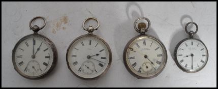 A group of four vintage early 20th century silver pocket watches to include a La Trobe , 1582 ,