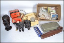 A group of vintage items to include tribal ebony art , boxed Viewmasters , cigarette cards ,