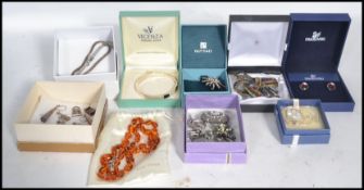 A group of vintage sterling silver jewellery to include necklaces , bracelets , pendants , charms