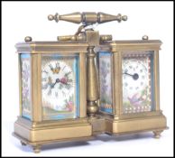 A vintage early 20th century brass carriage style clock and barometer compendium with porcelain