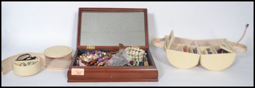 A collection of vintage costume jewellery to include cameo brooch, bracelet , pendants ,