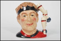 A rare Royal Doulton character jug entitled ' The Juggler ', baring a large backstamp ' this item is