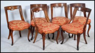 A set of six mahogany bar back 19th century Victorian Aesthetic movement dining chairs having chased