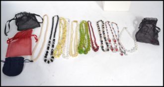 A group of vintage 20th century glass bead necklaces of various form. Please see images.