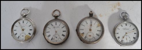 A group of four early 20th century silver pocket watches to include an Everite , Kays Lever , Acme