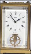 A 20th century German brass cased glass panel carriage clock by Schatz and Sohne having a two