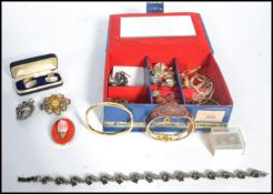 A collection of vintage costume jewellery to include many rings , necklaces bracelets earrings