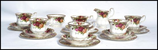 A Royal Albert Old Country Roses tea service consisting of cups , saucers , side plates etc.