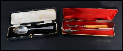 A silver hallmarked 18th century pickle fork, Ivory handle together with a hallmarked cased