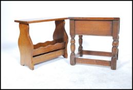 A 20th century oak work sewing box, lift up lid with sectional interior together with an oak