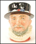 A Royal Doulton rare character colourway jug of the Beefeater having yellow highlights D6206. In
