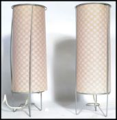 A pair of matching retro 20th century table / bedside lamps, each lamp constructed from a simple
