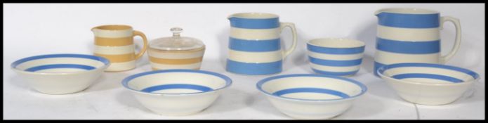 A TG Green vintage blue and white stripe part service comprising bowls, jugs of varying sizes, sugar